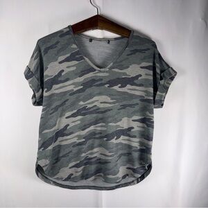 Camo shirt. I don’t know the brand. But they are a size small.